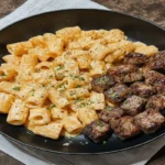 Cajun Steak Tips in Cheesy Rigatoni Parmesan Sauce